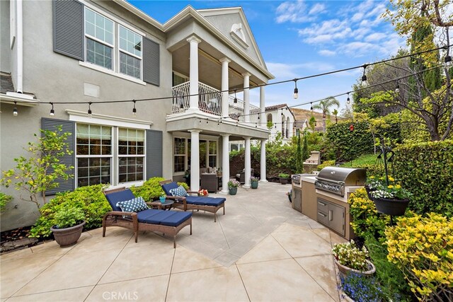 7 Illuminata Ln, Ladera Ranch, CA 92694 - view of patio with a balcony and an outdoor hangout area