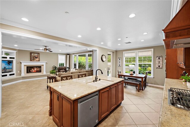 7 Illuminata Ln, Ladera Ranch, CA 92694 - kitchen with stainless steel appliances, a sink, ornamental molding, light tile patterned floors, and recessed lighting