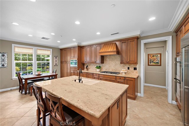 7 Illuminata Ln, Ladera Ranch, CA 92694 - kitchen with a sink, brown cabinetry, crown molding, stainless steel appliances, and backsplash
