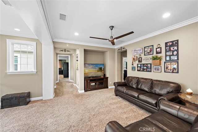7 Illuminata Ln, Ladera Ranch, CA 92694 - carpeted living area featuring ceiling fan, crown molding, baseboards, and recessed lighting