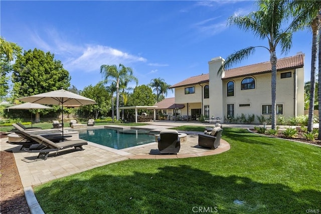 1623 Northhampton Dr, Riverside, CA 92506 - swimming pool featuring a yard and a patio area