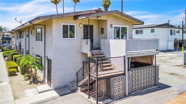 2018 Las Vegas, Pomona, CA 91767 - view of front of house with stairs and stucco siding