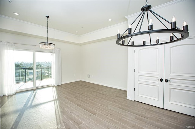 1598 Long Bch Unit 405, Long Beach, CA 90813 - unfurnished living room featuring a chandelier, ornamental molding, wood finished floors, baseboards, and recessed lighting