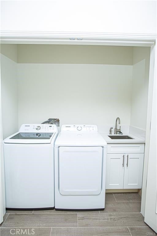 1598 Long Bch Unit 405, Long Beach, CA 90813 - laundry room with cabinet space, independent washer and dryer, and wood tiled floors