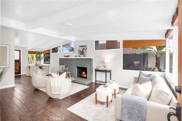 9 W Avenida Cornelio, San Clemente, CA 92672 - living area featuring beamed ceiling, baseboards, a fireplace, and hardwood / wood-style flooring
