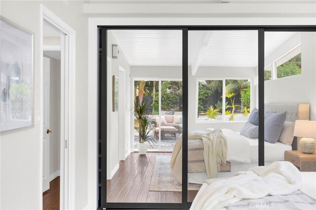 9 W Avenida Cornelio, San Clemente, CA 92672 - bedroom with beamed ceiling, wood finished floors, and baseboards