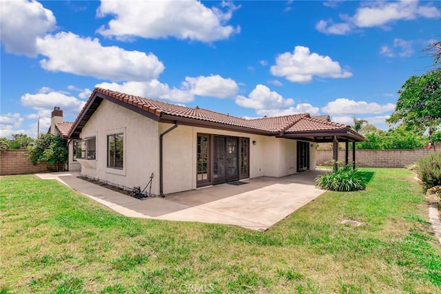 5697 Los Robles, La Verne, CA 91750 - back of property with a tiled roof, a patio area, stucco siding, and a chimney