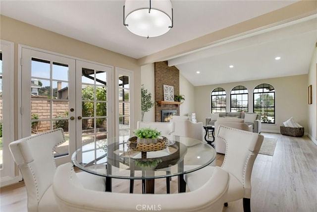 5697 Los Robles, La Verne, CA 91750 - dining space featuring a brick fireplace, french doors, light wood-style floors, baseboards, and recessed lighting