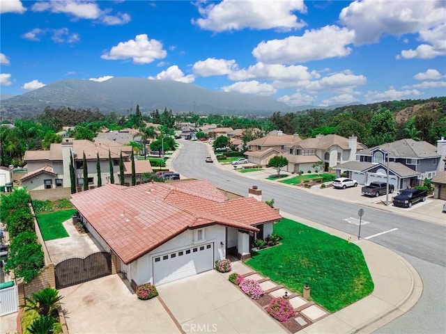 5697 Los Robles, La Verne, CA 91750 - aerial view of residential area featuring a mountainous background