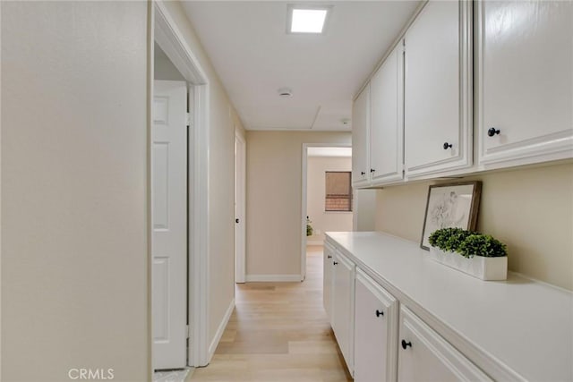 5697 Los Robles, La Verne, CA 91750 - hallway featuring light wood-style flooring and baseboards