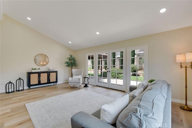 5697 Los Robles, La Verne, CA 91750 - living room with french doors, light wood finished floors, baseboards, recessed lighting, and lofted ceiling