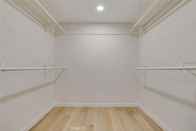 5697 Los Robles, La Verne, CA 91750 - walk in closet with light wood finished floors