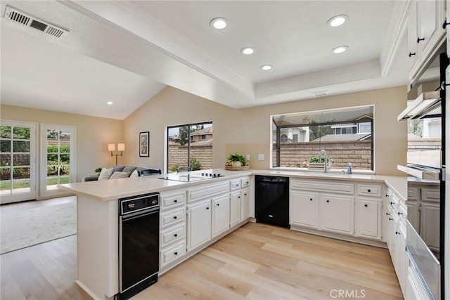 5697 Los Robles, La Verne, CA 91750 - kitchen featuring black dishwasher, a sink, a peninsula, light wood finished floors, and open floor plan