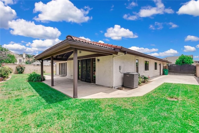 5697 Los Robles, La Verne, CA 91750 - rear view of house featuring central AC unit, a patio area, stucco siding, and a tile roof