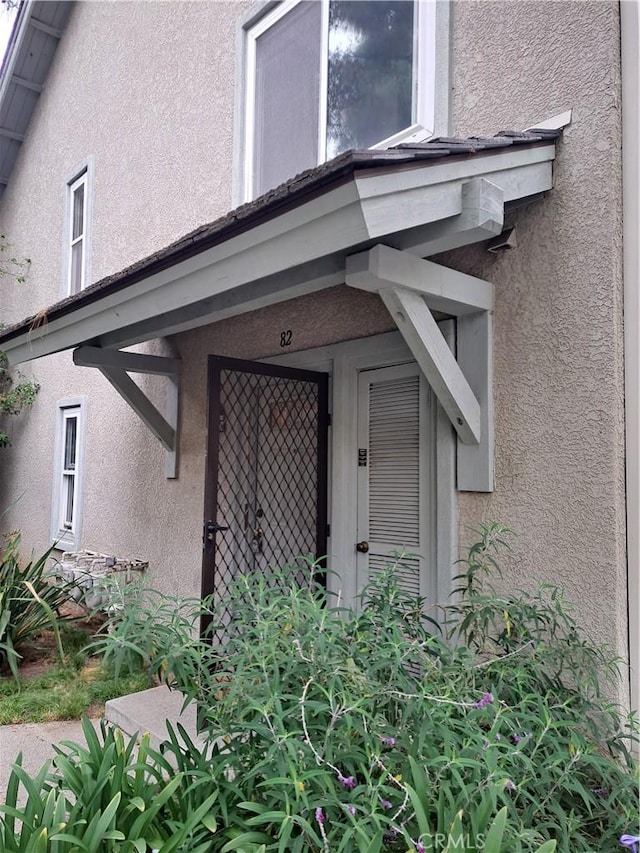 7131 Farralone Ave Unit 82, Canoga Park, CA 91303 - view of exterior entry with stucco siding