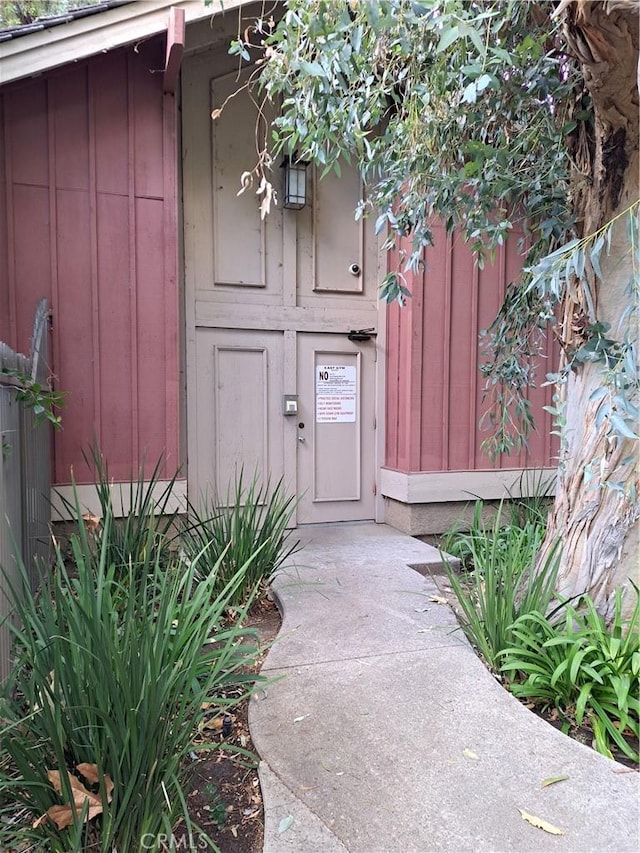 7131 Farralone Ave Unit 82, Canoga Park, CA 91303 - doorway to property with board and batten siding