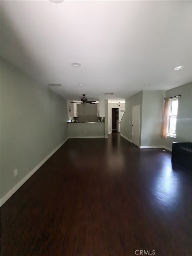 7131 Farralone Ave Unit 82, Canoga Park, CA 91303 - unfurnished living room featuring baseboards, dark wood-style flooring, recessed lighting, and a ceiling fan