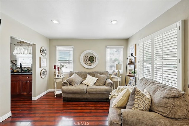 210 W Tichenor St, Compton, CA 90220 - living room with dark wood-style flooring, baseboards, and recessed lighting