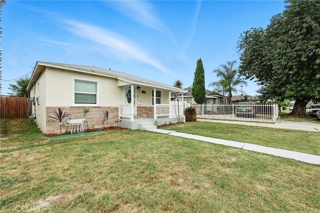 210 W Tichenor St, Compton, CA 90220 - ranch-style house featuring a porch, stucco siding, and stone siding