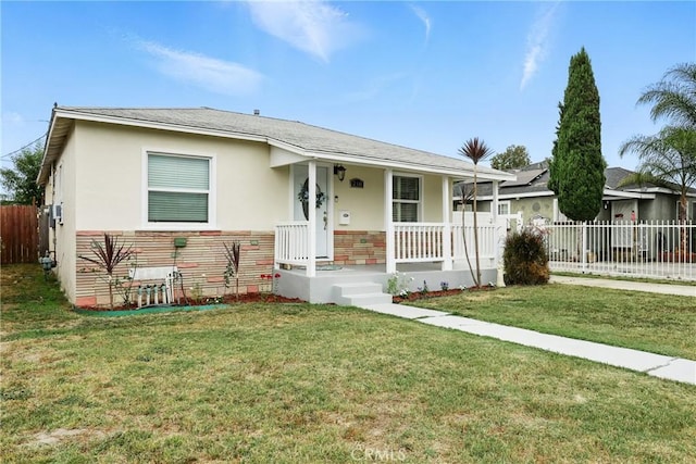 210 W Tichenor St, Compton, CA 90220 - view of front of house featuring covered porch and stucco siding