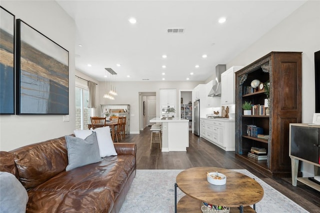 27227 Coyote Bush Ct, Valencia, CA 91381 - living room featuring dark wood-style floors and recessed lighting