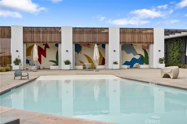 27227 Coyote Bush Ct, Valencia, CA 91381 - community pool with a patio and ceiling fan