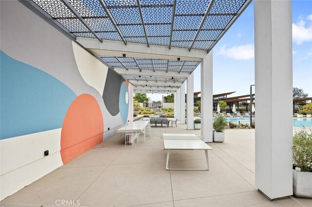 27227 Coyote Bush Ct, Valencia, CA 91381 - view of patio / terrace featuring a community pool, a pergola, and outdoor dining area