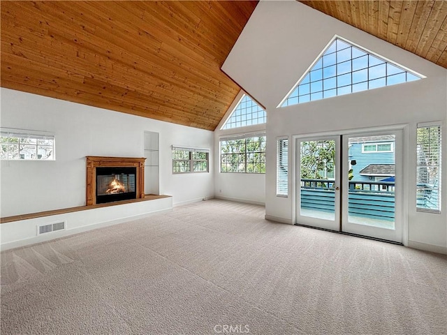 801 Nantasket Ct Unit B, San Diego, CA 92109 - unfurnished living room with high vaulted ceiling, wood ceiling, carpet, healthy amount of natural light, and a glass covered fireplace