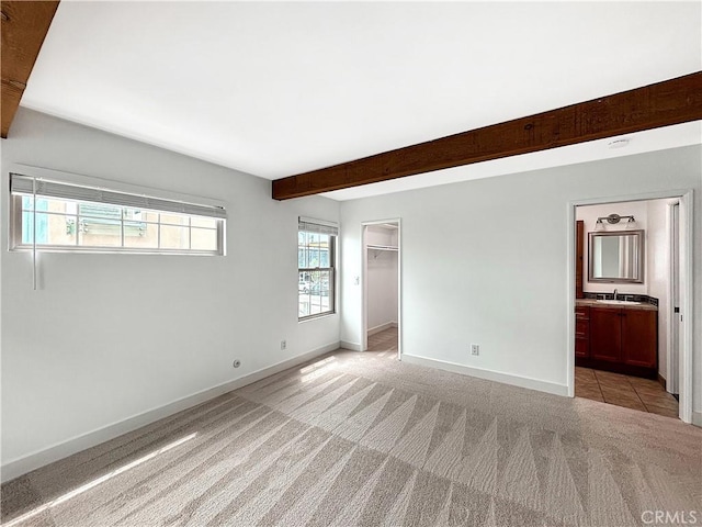 801 Nantasket Ct Unit B, San Diego, CA 92109 - unfurnished bedroom featuring light colored carpet, beamed ceiling, a closet, a spacious closet, and ensuite bathroom