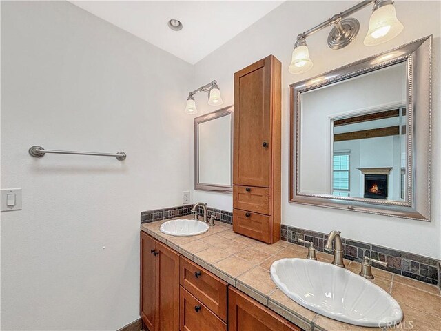 801 Nantasket Ct Unit B, San Diego, CA 92109 - full bath featuring double vanity and a warm lit fireplace