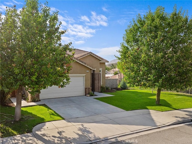 7476 Sequoia Ln, Highland, CA 92346 - view of property hidden behind natural elements with driveway, an attached garage, stucco siding, brick siding, and a tiled roof