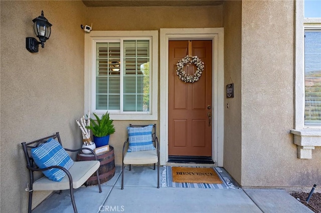 7476 Sequoia Ln, Highland, CA 92346 - doorway to property featuring stucco siding