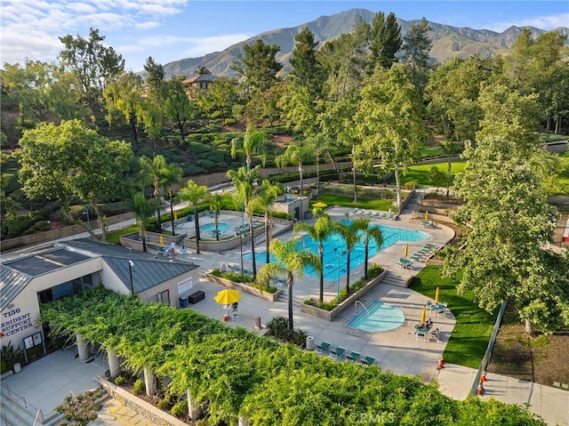 7476 Sequoia Ln, Highland, CA 92346 - view of property's community featuring a swimming pool and a mountain view