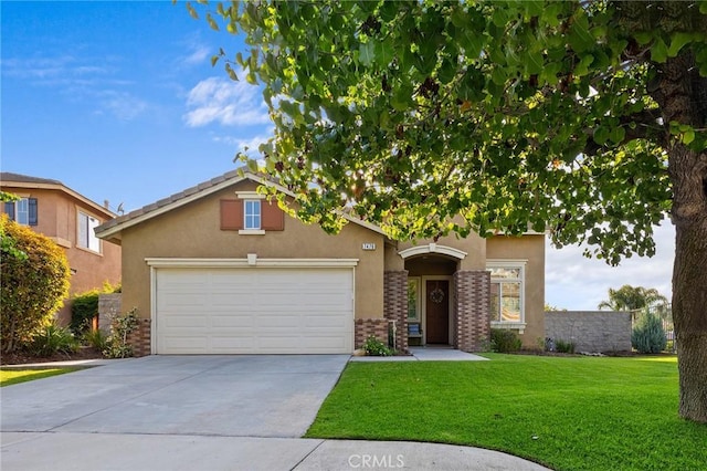 7476 Sequoia Ln, Highland, CA 92346 - view of front of home with stucco siding, concrete driveway, a front yard, an attached garage, and brick siding