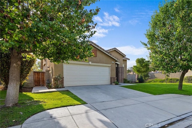 7476 Sequoia Ln, Highland, CA 92346 - view of property hidden behind natural elements featuring driveway, stucco siding, an attached garage, stone siding, and brick siding