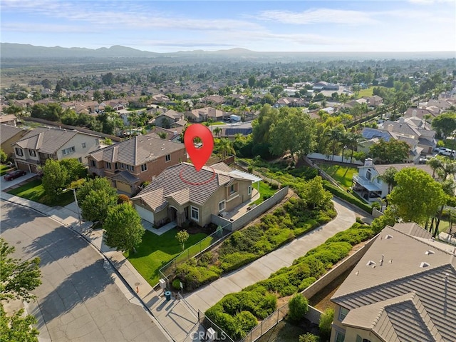 7476 Sequoia Ln, Highland, CA 92346 - aerial perspective of suburban area featuring a mountainous background