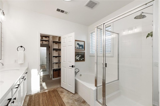7476 Sequoia Ln, Highland, CA 92346 - full bathroom featuring a shower stall, double vanity, and a bath