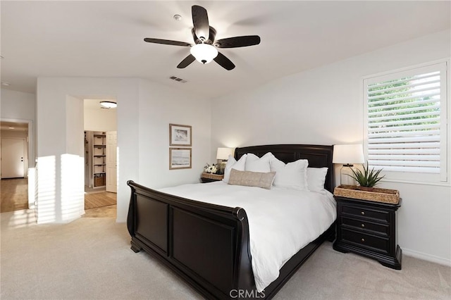 7476 Sequoia Ln, Highland, CA 92346 - bedroom featuring light colored carpet, ceiling fan, and baseboards