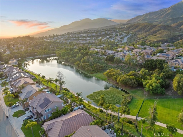 7476 Sequoia Ln, Highland, CA 92346 - aerial perspective of suburban area with a water and mountain view