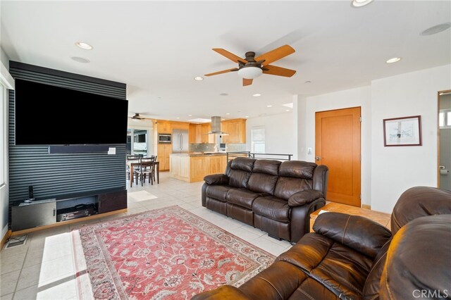 210 El Porto St, Manhattan Beach, CA 90266 - living area featuring light tile patterned floors, recessed lighting, and ceiling fan