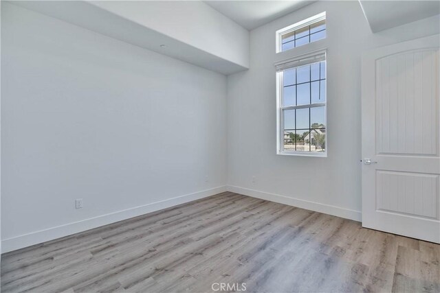 1734 Lester Ave, Clovis, CA 93619 - empty room featuring wood finished floors and baseboards