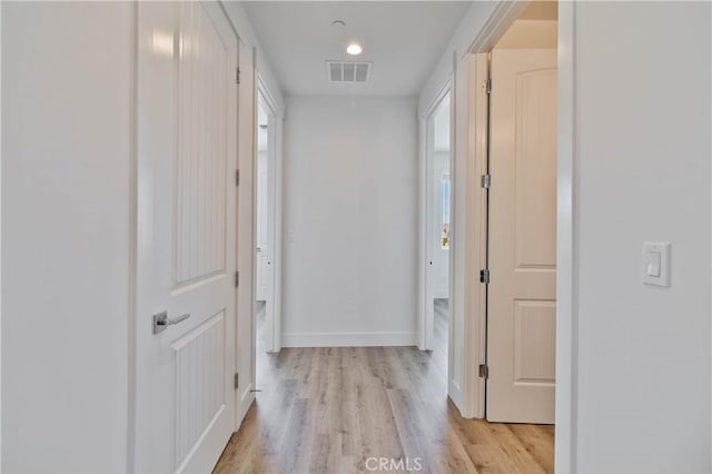 1734 Lester Ave, Clovis, CA 93619 - corridor with light wood-type flooring and baseboards