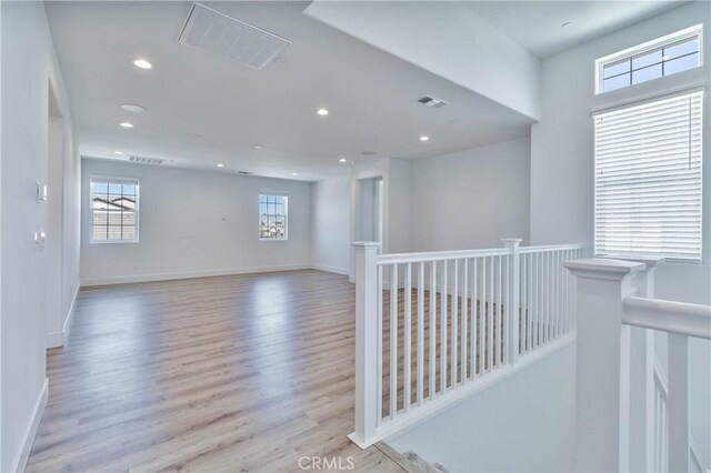 1734 Lester Ave, Clovis, CA 93619 - spare room with wood finished floors, recessed lighting, and baseboards