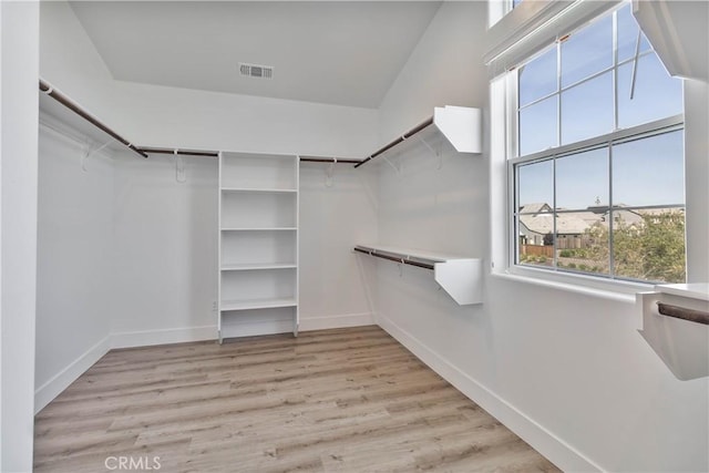 1734 Lester Ave, Clovis, CA 93619 - spacious closet featuring light wood-type flooring