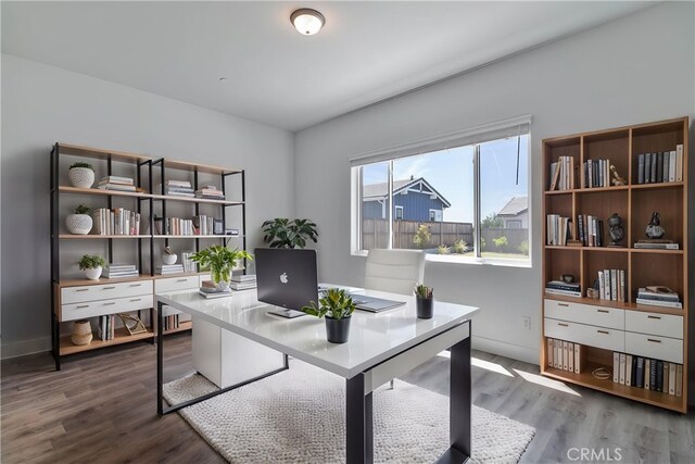 1734 Lester Ave, Clovis, CA 93619 - office area featuring wood finished floors and baseboards