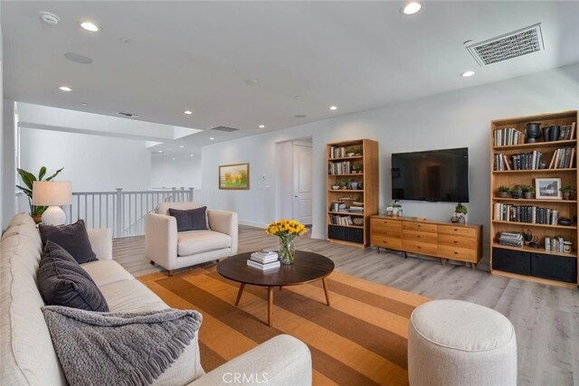 1734 Lester Ave, Clovis, CA 93619 - living room featuring light wood-style floors and recessed lighting