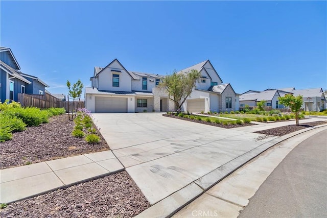 1734 Lester Ave, Clovis, CA 93619 - modern farmhouse with a residential view, a standing seam roof, a garage, concrete driveway, and metal roof