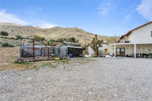 9075 Mesa Vista St, Apple Valley, CA 92308 - view of yard with a mountain view and an outbuilding