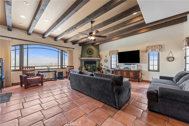 9075 Mesa Vista St, Apple Valley, CA 92308 - living area featuring beamed ceiling, ceiling fan, a large fireplace, baseboards, and recessed lighting