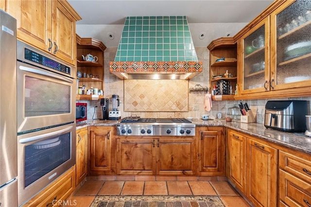 9075 Mesa Vista St, Apple Valley, CA 92308 - kitchen with appliances with stainless steel finishes, open shelves, decorative backsplash, and brown cabinetry